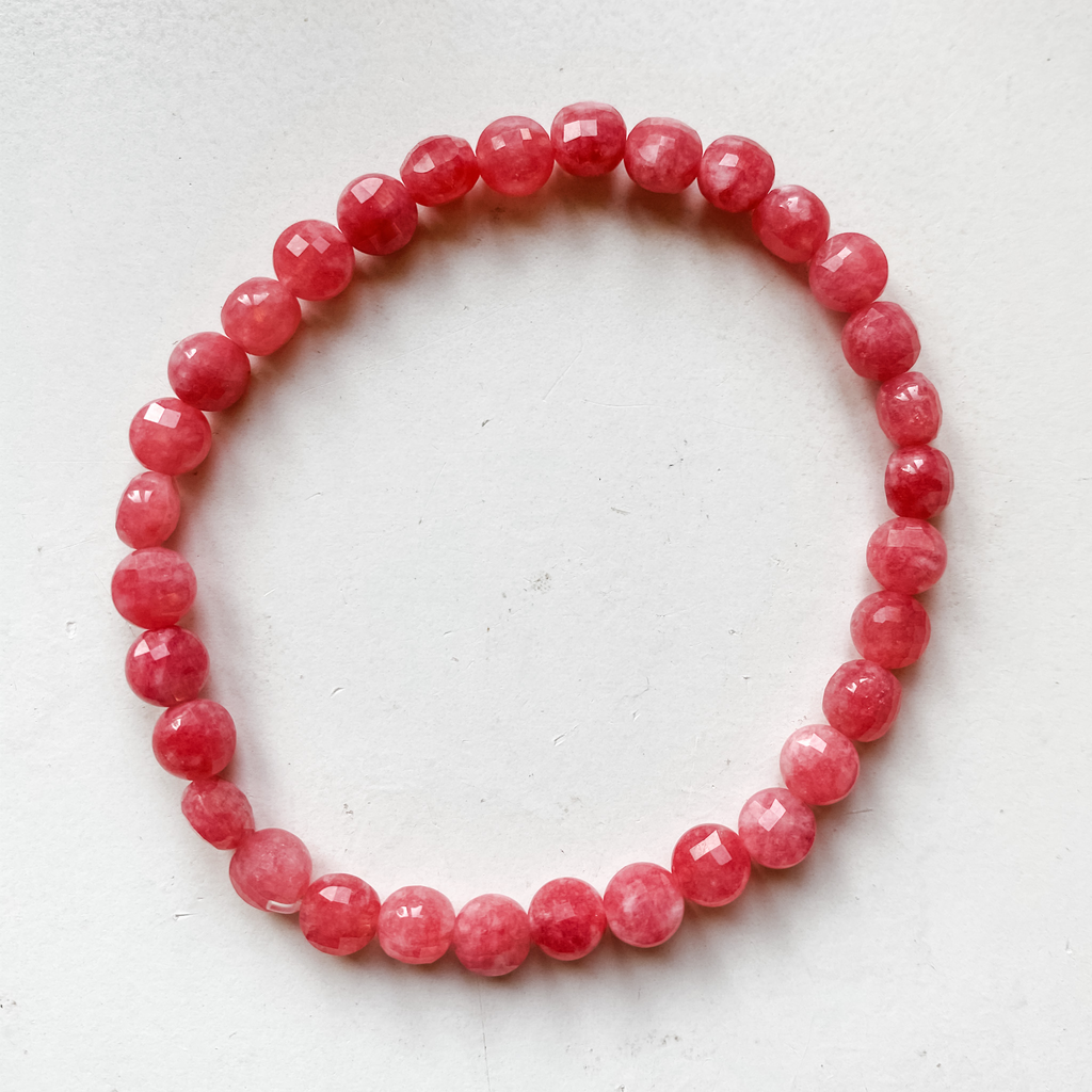 Bracelet 6mm rhodocrosite plat rond facetté