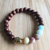 Bracelet amazonite avec Bouddha en laiton et perles en noyer
