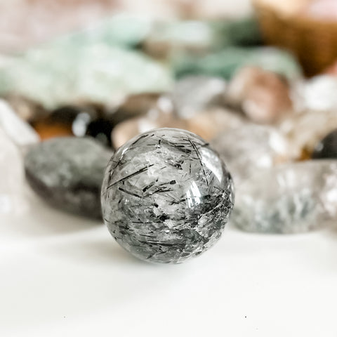 Tourmalinated quartz sphere